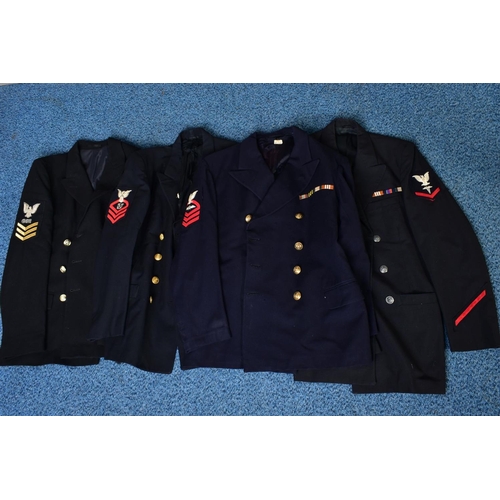 131 - FOUR NAVAL DRESS JACKETS, with sleeve insignia and medal ribbons