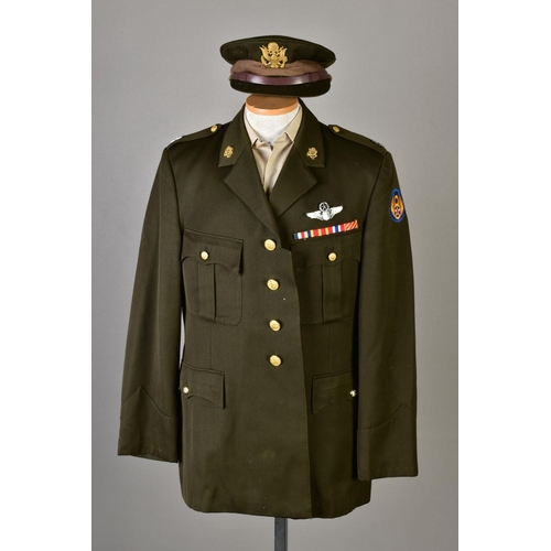 132 - FIVE US ARMY DRESS JACKETS, with five sand coloured shirts and five green uniform caps, with US insi... 