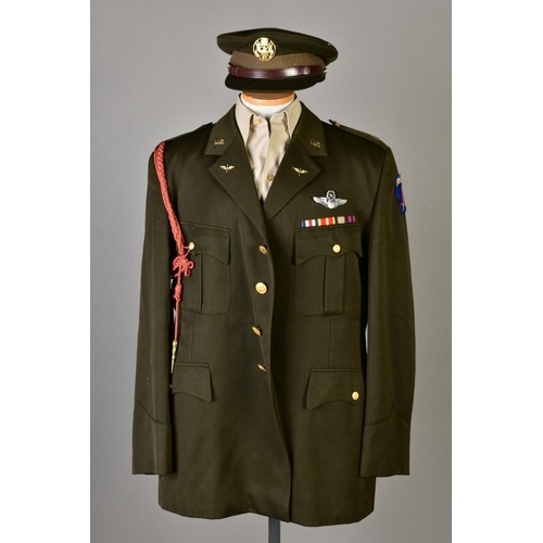 132 - FIVE US ARMY DRESS JACKETS, with five sand coloured shirts and five green uniform caps, with US insi... 