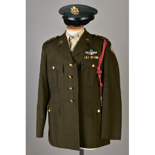 132 - FIVE US ARMY DRESS JACKETS, with five sand coloured shirts and five green uniform caps, with US insi... 