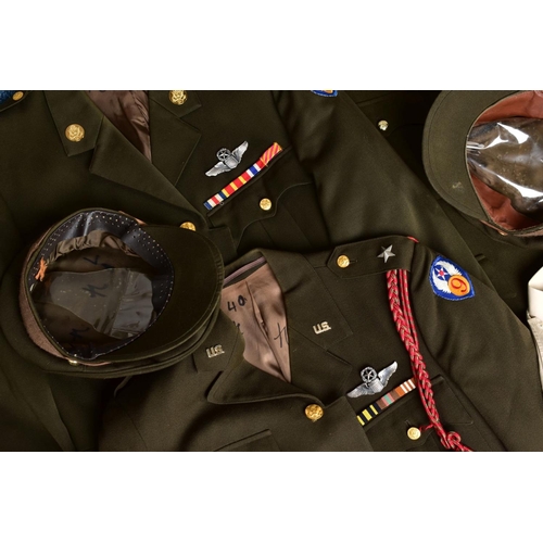 132 - FIVE US ARMY DRESS JACKETS, with five sand coloured shirts and five green uniform caps, with US insi... 