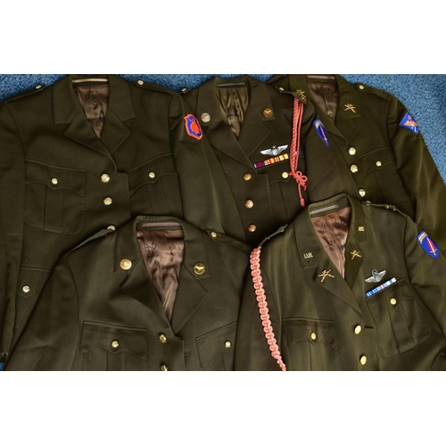 133 - FIVE US ARMY DRESS JACKETS, with sleeve insignia, badges, medal ribbons etc, WWII era or later