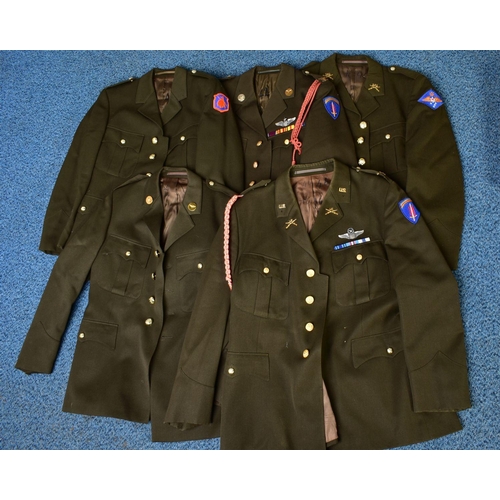 133 - FIVE US ARMY DRESS JACKETS, with sleeve insignia, badges, medal ribbons etc, WWII era or later