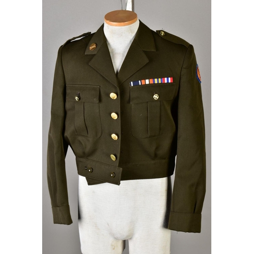 134 - FIVE US ARMY SHORT, belted battledress jackets, WWII style, some with insignia, sleeve etc and medal... 