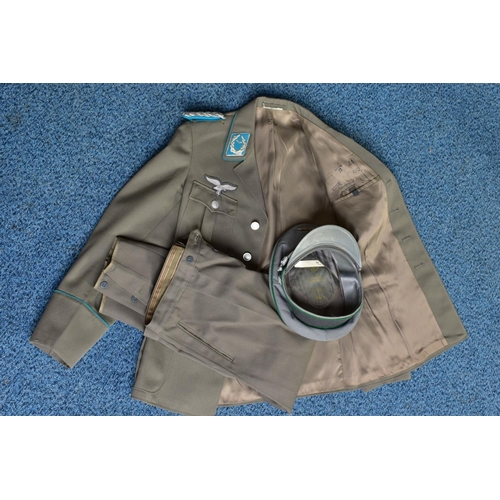 135 - A GERMAN WWII PERIOD LUFTWAFFE DRESS TUNIC, with shoulder boards, Breast Eagle and collar insignia, ... 