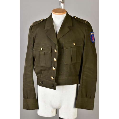 137 - FIVE US ARMY WWII STYLE SHORT BATTLEDRESS JACKETS, some with insignia, medal ribbons etc