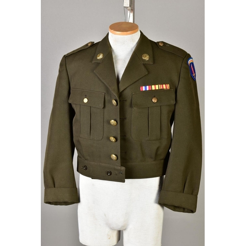 137 - FIVE US ARMY WWII STYLE SHORT BATTLEDRESS JACKETS, some with insignia, medal ribbons etc