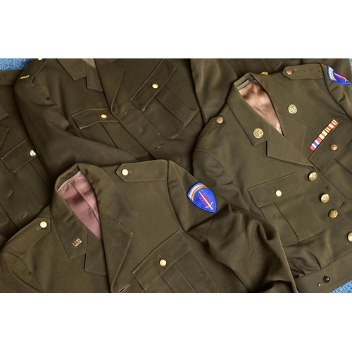 137 - FIVE US ARMY WWII STYLE SHORT BATTLEDRESS JACKETS, some with insignia, medal ribbons etc