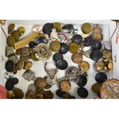 138 - A BOX CONTAINING A NUMBER OF BADGES, BUTTONS AND OTHER ITEMS OF A WWI INTEREST, including a pair of ... 