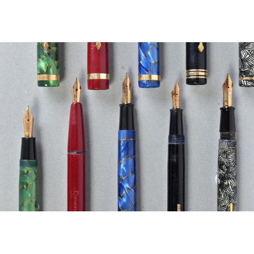 21 - FIVE CONWAY STEWART FOUNTAIN PENS including a No 85L in gold vein marbled blue with a 14ct No 3 nib,... 