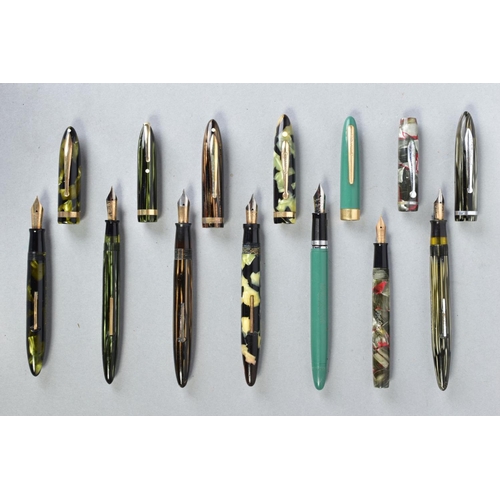 28 - SEVEN VINTAGE SHEAFFER FOUNTAIN PENS including two marbled green with no identifying numbers, two 50... 