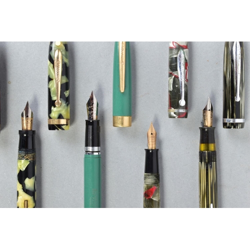 28 - SEVEN VINTAGE SHEAFFER FOUNTAIN PENS including two marbled green with no identifying numbers, two 50... 