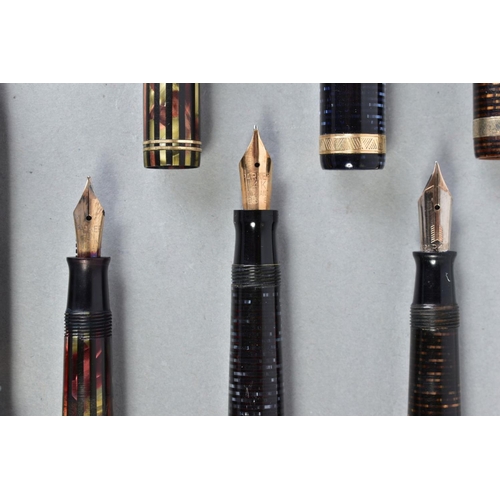 29 - A PARKER VACUMATIC in Laminated Blue in near perfect condition and appears to fill, a Vacumatic in l... 