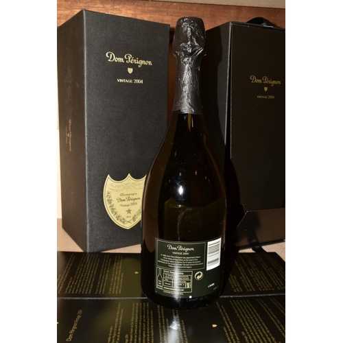 310 - A BOTTLE OF DOM PERIGNON CHAMPAGNE VINTAGE 2004, boxed (box shows some scuffing at base)