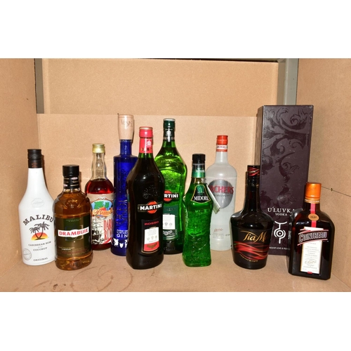 314 - TWENTY FIVE BOTTLES OF ASSORTED SPIRITS AND LIQUEURS, to include Bacardi Rum, Gordon's Gin, Uluvka V... 