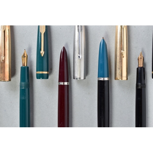 32 - THREE PARKER '51' AND TWO SLIMFOLD FOUNTAIN PENS including two black 51S with gold filled caps, a bu... 