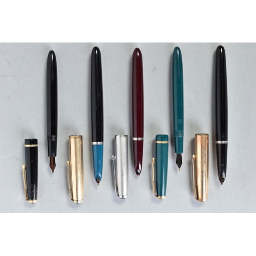 32 - THREE PARKER '51' AND TWO SLIMFOLD FOUNTAIN PENS including two black 51S with gold filled caps, a bu... 