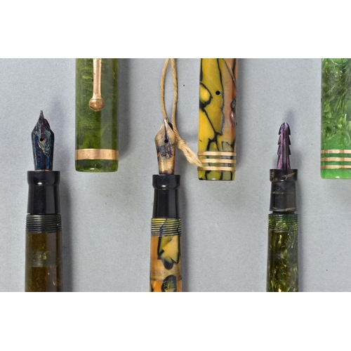 34 - THREE VINTAGE PARKER DUOFOLD FOUNTAIN PENS consisting of a Duofold Junior in marbled green, a lighte... 