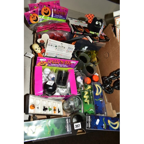 357 - TWO BOXES OF HALLOWEEN THEMED ITEMS, including tinsel, face paint, candleholders, napkins, invitatio... 