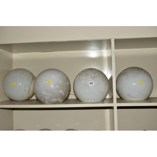 387 - A SET OF FOUR OPAQUE WHITE GLASS SPHERICAL CEILING LIGHT SHADES WITH OVERPAINTED NICKEL PLATED FITTI... 