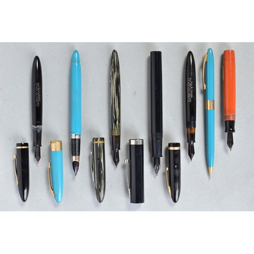 39 - A BOXED WITH TAGS SHEAFFER VALIANT SNORKEL FOUNTAIN AND PENCIL SET in turquoise and gold trim, a She... 