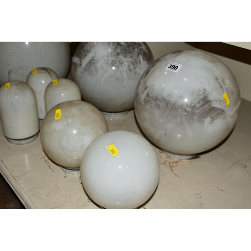 390 - A GROUP OF SEVEN VARIOUS OPAQUE WHITE GLASS LIGHT SHADES, including two pairs of spherical type in t... 