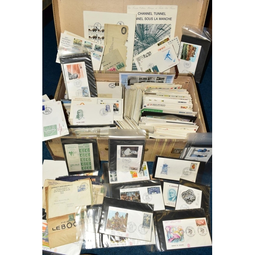 410 - A LARGE COLLECTION OF FIRST DAY COVERS AND COMMERCIAL COVERS in three suitcases and a box, together ... 