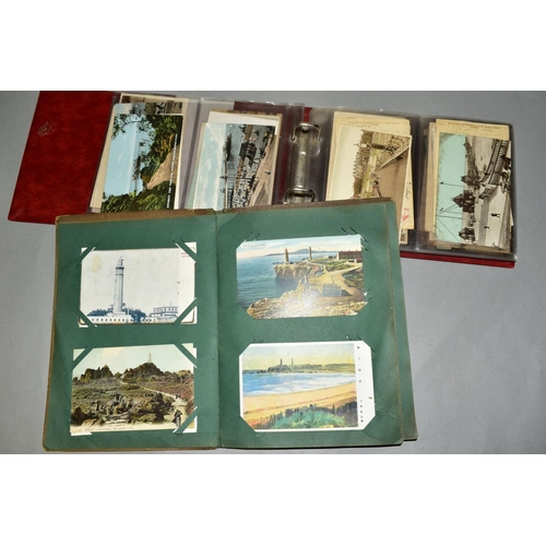 417 - TWO ALBUMS OF POSTCARDS, the first album contains sixty eight postcards of British Piers and the sec... 