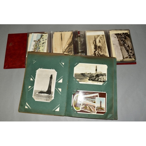 417 - TWO ALBUMS OF POSTCARDS, the first album contains sixty eight postcards of British Piers and the sec... 