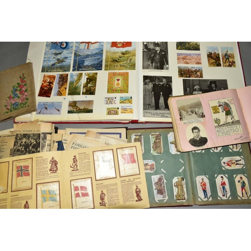 419 - A COLLECTION OF EPHEMERA consisting of an early to mid 20th Century scrapbook containing newspaper c... 