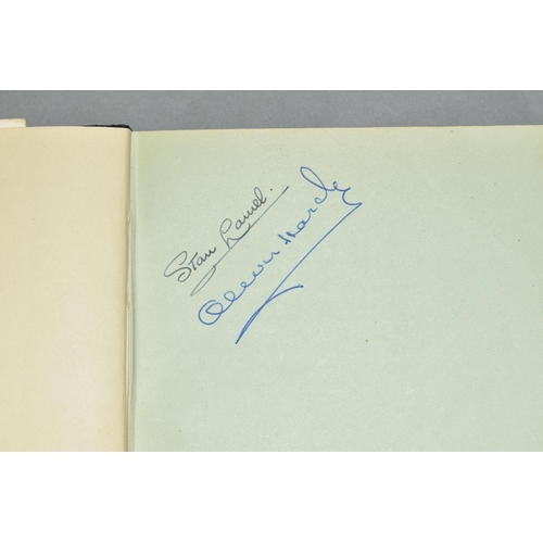 422 - AN AUTOGRAPH ALBUM containing many signatures of well known personalities from showbusiness in the 1... 