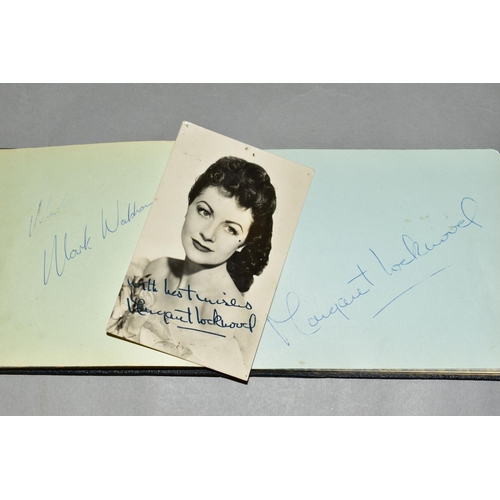 422 - AN AUTOGRAPH ALBUM containing many signatures of well known personalities from showbusiness in the 1... 