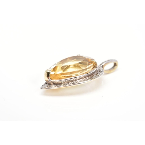 53 - A 9CT GOLD PENDANT, designed with a pear cut citrine within a raised three claw setting and diamond ... 