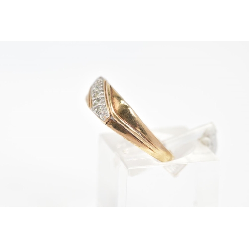 64 - A 9CT GOLD RING, designed as a diagonal line of three single cut diamonds in pave settings to the ta... 