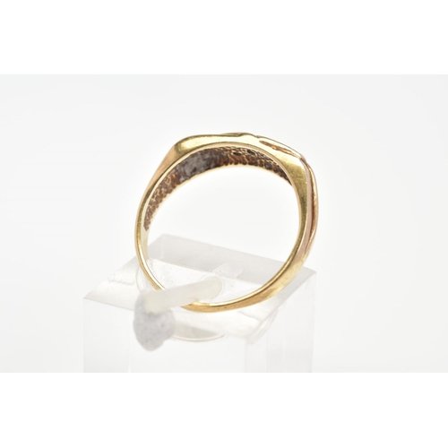 64 - A 9CT GOLD RING, designed as a diagonal line of three single cut diamonds in pave settings to the ta... 