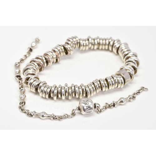 70 - TWO BRACELETS, to include an elasticated silver plated metal bracelet and a belcher link chain brace... 