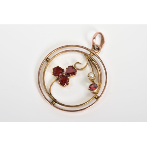 71 - AN EARLY 20TH CENTURY GARNET AND SPLIT PEARL PENDANT, of circular open work design featuring garnet ... 