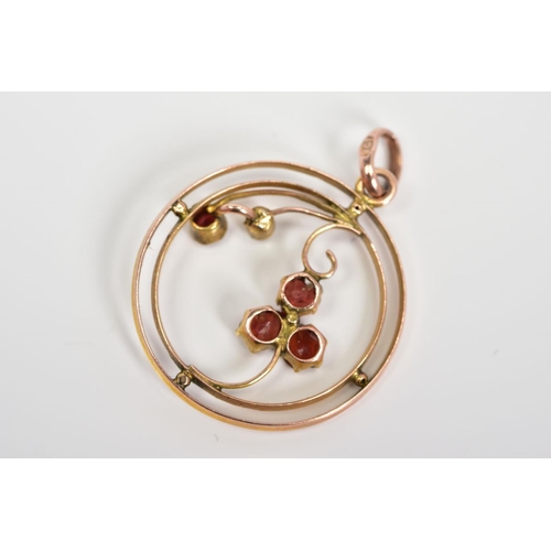 71 - AN EARLY 20TH CENTURY GARNET AND SPLIT PEARL PENDANT, of circular open work design featuring garnet ... 