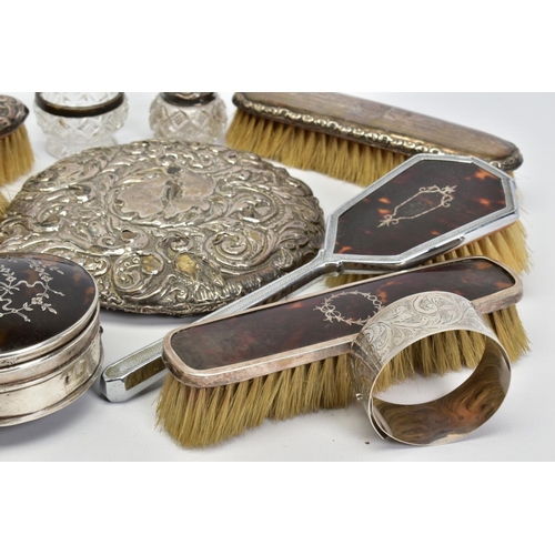 73 - A SMALL BOX OF DRESSING TABLE ACCESSORIES, to include a pair of silver and tortoiseshell panel brush... 