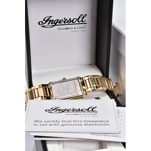 79 - A GOLD PLATED INGERSOLL RECTANGULAR QUARTZ WRISTWATCH, patterned cream dial, stone set numerals and ... 