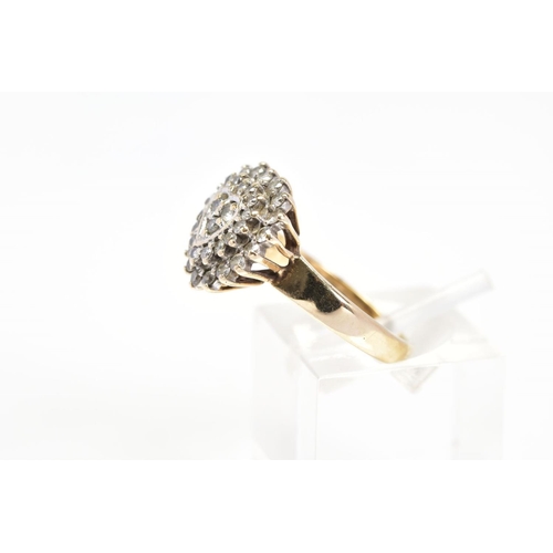 89 - A 9CT GOLD HEART SHAPE DIAMOND CLUSTER RING, designed as a three tiered cluster in a heart shape out... 