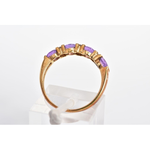 90 - AN AMETHYST AND DIAMOND RING, designed as a line of four circular amethysts with bar spacers set wit... 