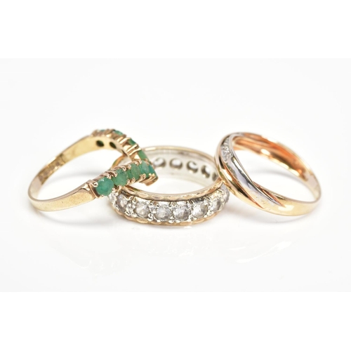 96 - THREE RINGS, comprising a 9ct gold ring set with three single cut diamonds, a 9ct gold v-shape ring ... 