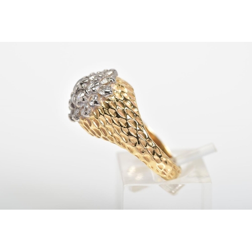 10 - A DIAMOND DRESS RING, designed as a three tiered cluster of brilliant cut diamonds to the textured t... 