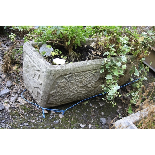 1009 - TWO COMPOSITE RECTANGULAR PLANTERS, one with floral motifs all round, length 76cm and a smaller one ... 