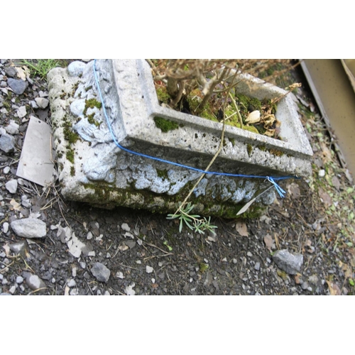 1009 - TWO COMPOSITE RECTANGULAR PLANTERS, one with floral motifs all round, length 76cm and a smaller one ... 