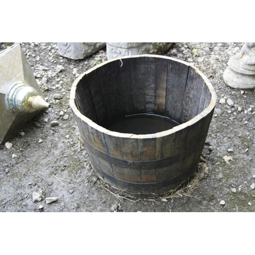 1014 - A HALF WHISKEY BARREL PLANTER, height 43cm