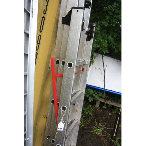 1024 - AN ALUMINIUM DOUBLE EXTENSION LADDER with tilt adjustable base and a folding step guard, height clos... 