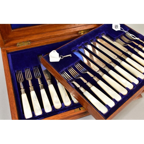 103 - AN OAK CASED EDWARDIAN SET OF SILVER AND MOTHER OF PEARL HANDLED DESSERT KNIVES AND FORKS, makers Ma... 