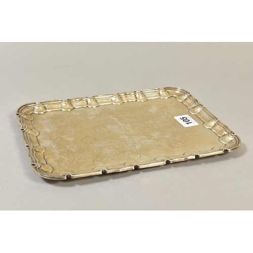 105 - AN EDWARDIAN SILVER RECTANGULAR TRAY, pie crust edge, engraved with an eagle on a branch, on four ro... 